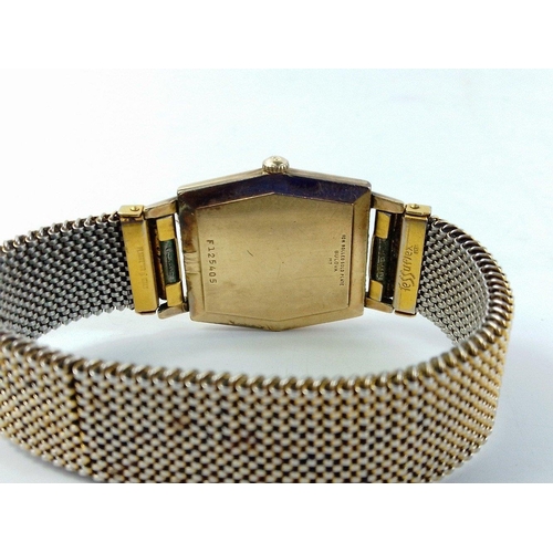 96 - A vintage BULOVA 10K rolled gold plate expanding bracelet watch F125405.  Ticking away at valuation.... 