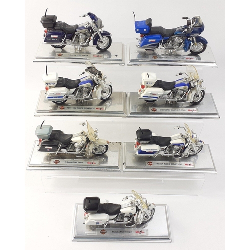 195 - MAISTO plastic police motor cycles x 7 without boxes but on stands to include Boston Police Departme... 