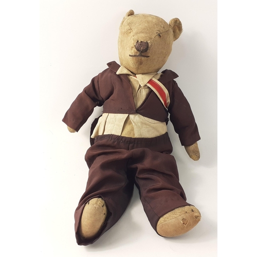 241 - An aged well-loved teddy standing 43cm tall#57