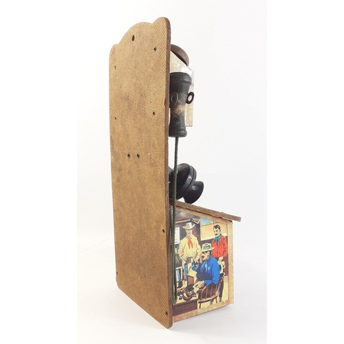 244 - YEEHAA! An original c1950s tin-plate toy AMERICAN RANCH PHONE Money Box, This example is made by Cod... 