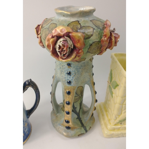 310 - A large Austria Amphora vase decorated with roses.  Stands 31cm tall approx, some damage to petals. ... 