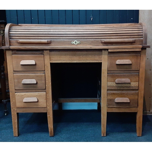 474 - A vintage oak roll top desk with 3 drawers to each side.  A classic look with contemporary usefulnes... 