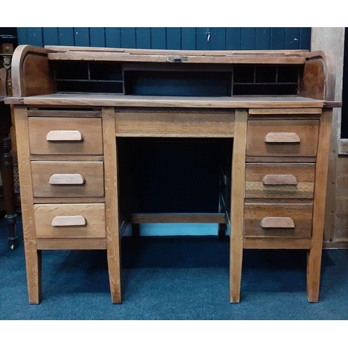 474 - A vintage oak roll top desk with 3 drawers to each side.  A classic look with contemporary usefulnes... 