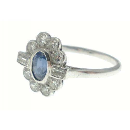 10 - A DAZZLING SAPPHIRE (6mm length) & DIAMOND (2mm diameter) PLAT stamped ladies ring in floral for... 