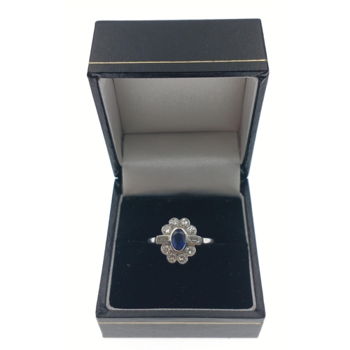 10 - A DAZZLING SAPPHIRE (6mm length) & DIAMOND (2mm diameter) PLAT stamped ladies ring in floral for... 