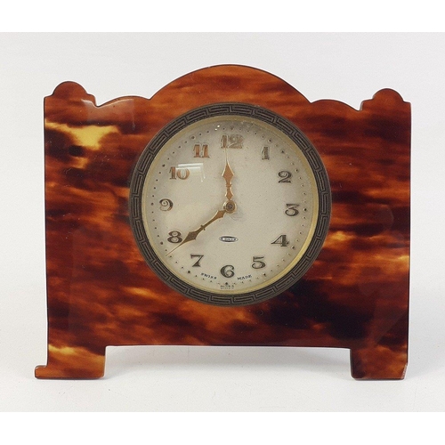 115 - A stunning little cased bakelite / tortoise shell case travelling 8 Day Swiss bedside clock.  Mechan... 