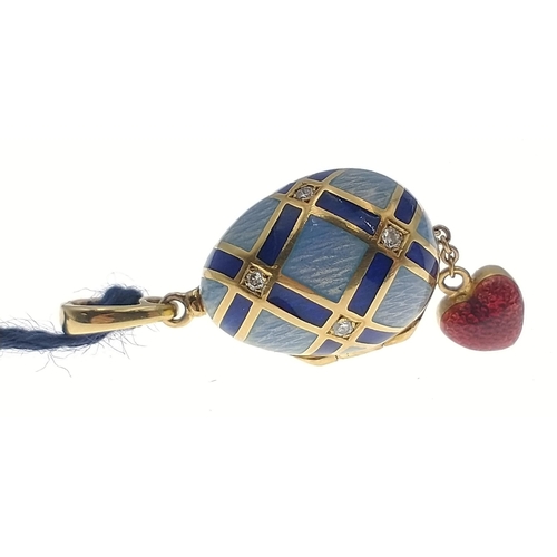 39 - EXQUISITE - A small 18ct yellow gold and diamond set pale blue and dark blue enamel FABERGE pendant ... 