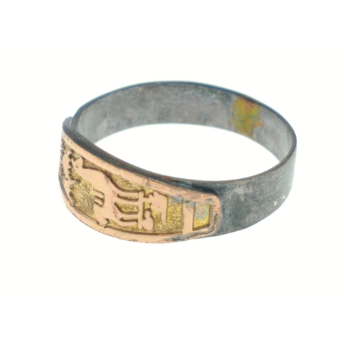 5 - A metal ring stamped 950 and 18k with applied Egyptian scene, size P, weight 2.3g approx#5