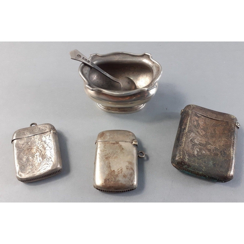 52 - A small lot of four silver hallmarked items weighing 69g approx includes two vestas, a salt and cond... 