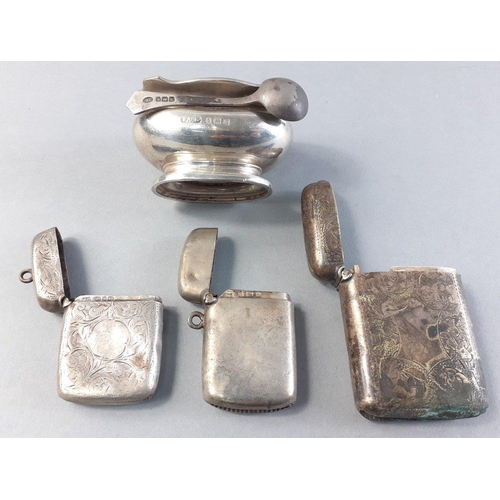 52 - A small lot of four silver hallmarked items weighing 69g approx includes two vestas, a salt and cond... 