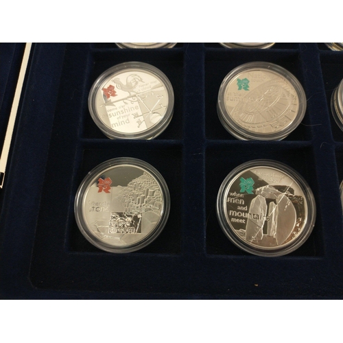 65 - WESTMINSTER MINT 0.925 STERLING SILVER COIN SET. Thirteen coins each with a Five Pound face value. E... 