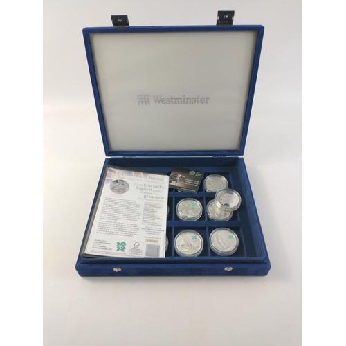 65 - WESTMINSTER MINT 0.925 STERLING SILVER COIN SET. Thirteen coins each with a Five Pound face value. E... 