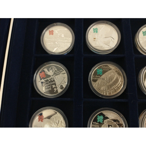 65 - WESTMINSTER MINT 0.925 STERLING SILVER COIN SET. Thirteen coins each with a Five Pound face value. E... 