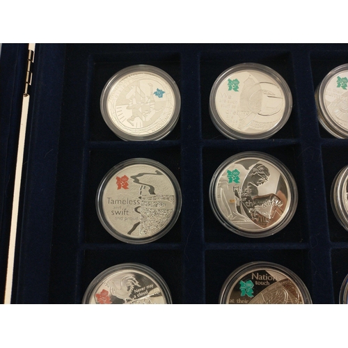 65 - WESTMINSTER MINT 0.925 STERLING SILVER COIN SET. Thirteen coins each with a Five Pound face value. E... 