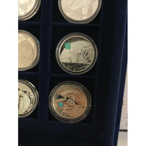 65 - WESTMINSTER MINT 0.925 STERLING SILVER COIN SET. Thirteen coins each with a Five Pound face value. E... 