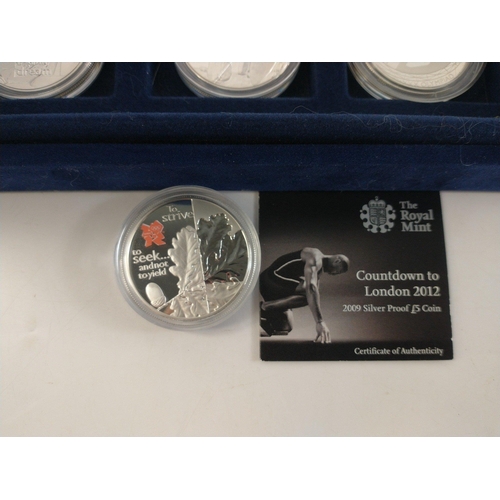 65 - WESTMINSTER MINT 0.925 STERLING SILVER COIN SET. Thirteen coins each with a Five Pound face value. E... 