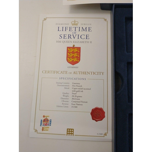 66 - In a Westminster Mint box.  A 2012 Five Pound Proof silver proof with certificate, an Alderney £... 