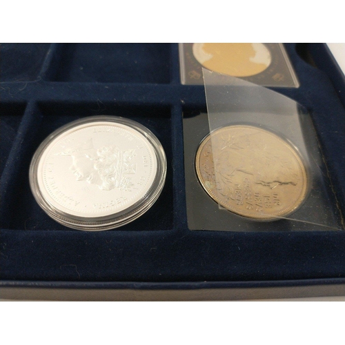 66 - In a Westminster Mint box.  A 2012 Five Pound Proof silver proof with certificate, an Alderney £... 