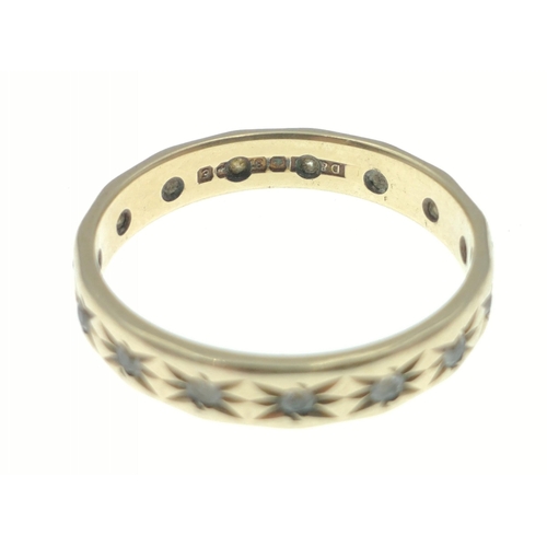 8 - A 9ct gold marked band with very small clear glass stones, size P, gross weight 2.4g approx#8