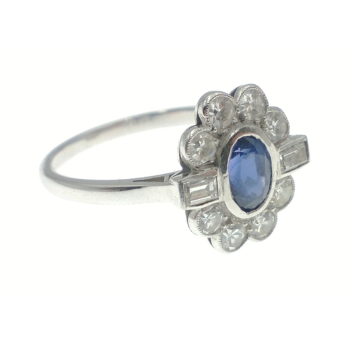 10 - A DAZZLING SAPPHIRE (6mm length) & DIAMOND (2mm diameter) PLAT stamped ladies ring in floral for... 