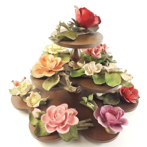 254 - FRANKLIN MINT PORCELAIN bisque sculpture of 12 months of roses with display stand.  One certificate ... 