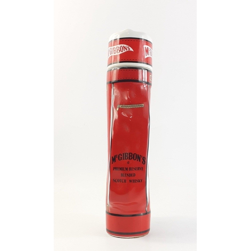 198 - A 700 ml McGibbons Premium Reserve Blended Scotch Whisky in presentation golf bag.#217