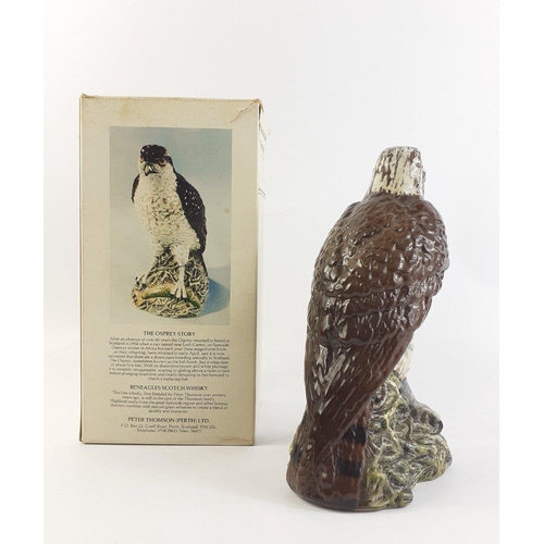 206 - A boxed Osprey ceramic decanter with contents of BENEAGLES whisky 13 1/3 fl oz.  Box has some wear.#... 