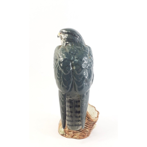 207 - A small WHYTE & MACKAY peregrine falcon decanter with 200ml contents. Stands 17cm high approx#22... 