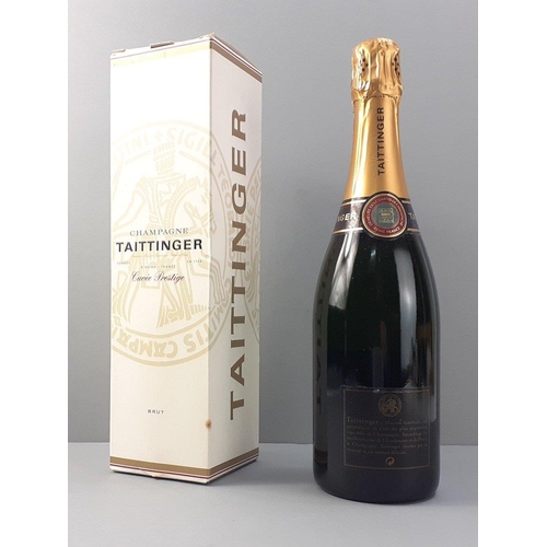 223 - A boxed bottle of TAITTINGER champagne brut, 750ml#243