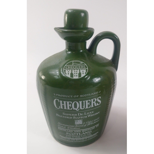 3 - A vintage OLD SMUGGLER flagon (22cm high), a CHEQUERS whisky flagon (22cm high) and a German made ba... 