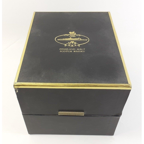 95 - A presentation box with sealed 75cl black ceramic flagon of QE2 Highland malt whisky made by Morriso... 