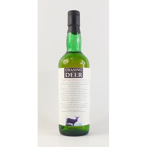 168 - CHASING THE DEER.  An interesting bottle of unbranded whisky with a local interest. The label shows ... 