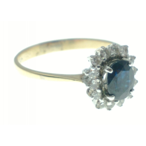 10 - A 18ct diamond and sapphire ring. Size M, gross weight 2.19g approx.  A lovely piece that displays b... 