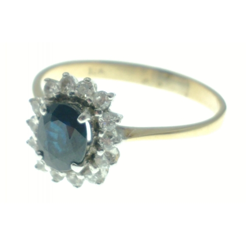 10 - A 18ct diamond and sapphire ring. Size M, gross weight 2.19g approx.  A lovely piece that displays b... 