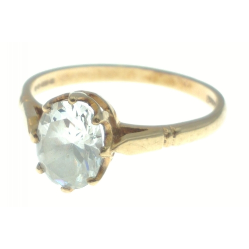 16 - A 9ct gold ring with large white clear centre stone. Size O. Gross weight 2.3g approx#16