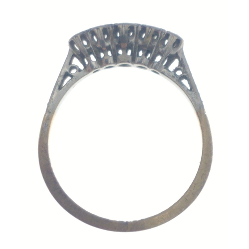 23 - A ring stamped 18ct Plat Set F8100 with five small inset diamonds. Size O, gross weight 2.25g approx... 