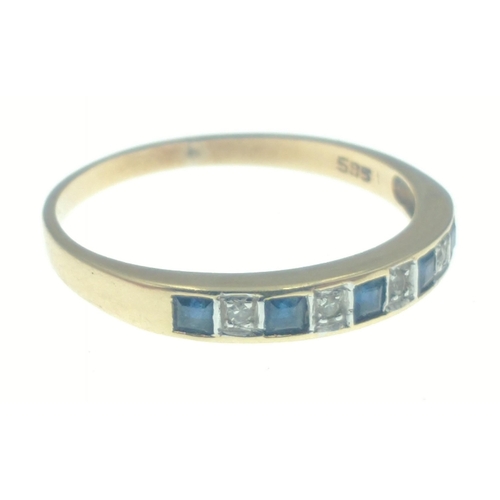 25 - A diamond and sapphire on a 585 stamped 14k band. Size P. Gross weight 1.79g approx. Diamonds tested... 