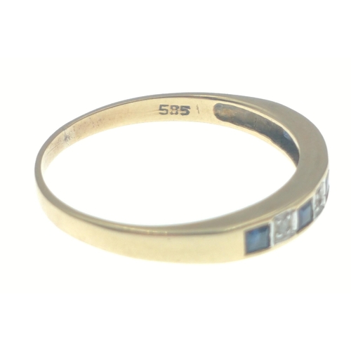 25 - A diamond and sapphire on a 585 stamped 14k band. Size P. Gross weight 1.79g approx. Diamonds tested... 