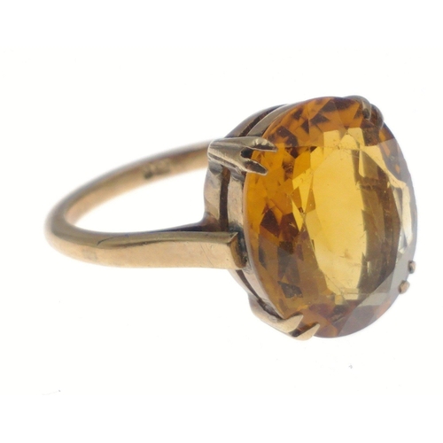 3 - A 9ct gold ring with large amber coloured centre stone. Size N. Gross weight 3.6g approx.#3