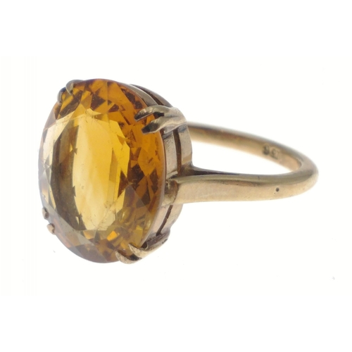 3 - A 9ct gold ring with large amber coloured centre stone. Size N. Gross weight 3.6g approx.#3