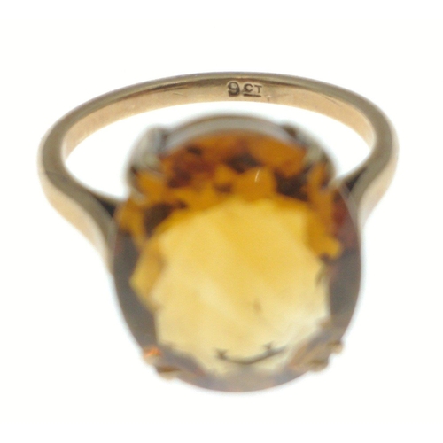 3 - A 9ct gold ring with large amber coloured centre stone. Size N. Gross weight 3.6g approx.#3