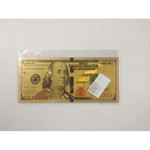 86 - A quantity of nicely produced gold banknotes in sealed packs. In excellent condition.#85