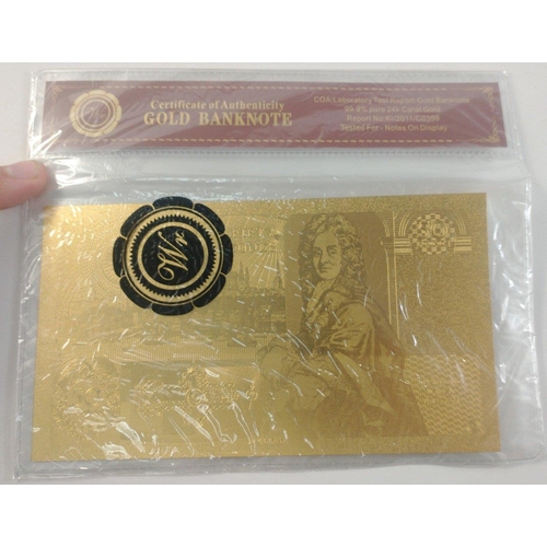 86 - A quantity of nicely produced gold banknotes in sealed packs. In excellent condition.#85