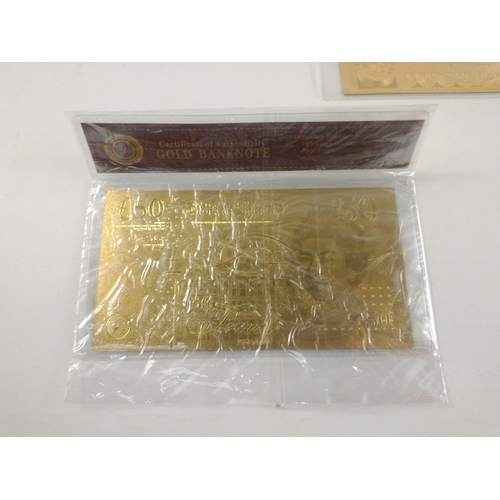 86 - A quantity of nicely produced gold banknotes in sealed packs. In excellent condition.#85