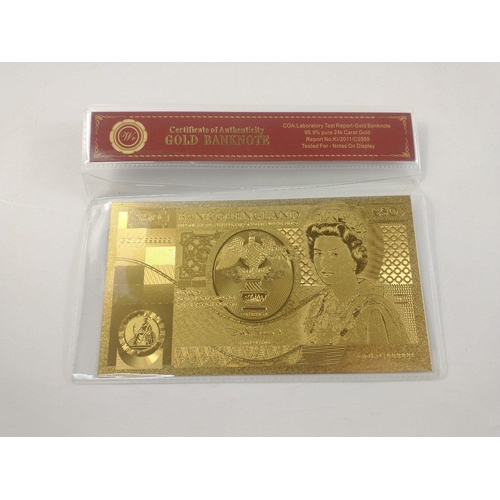 86 - A quantity of nicely produced gold banknotes in sealed packs. In excellent condition.#85