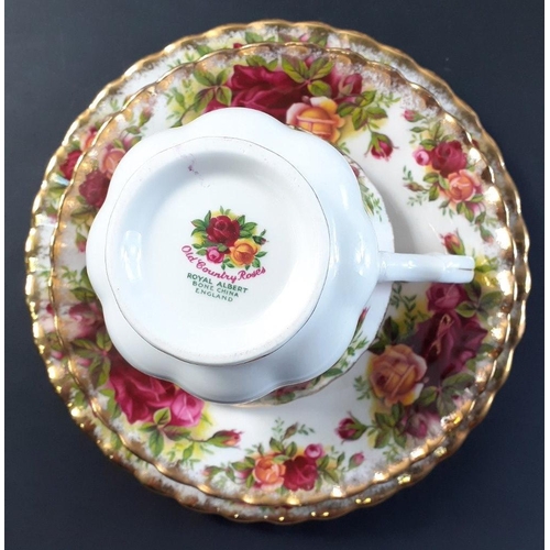 351 - ROYAL ALBERT COUNTRY ROSES tea set to include 12 cups, 12 saucers, 12 side plates, 1 large cake plat... 