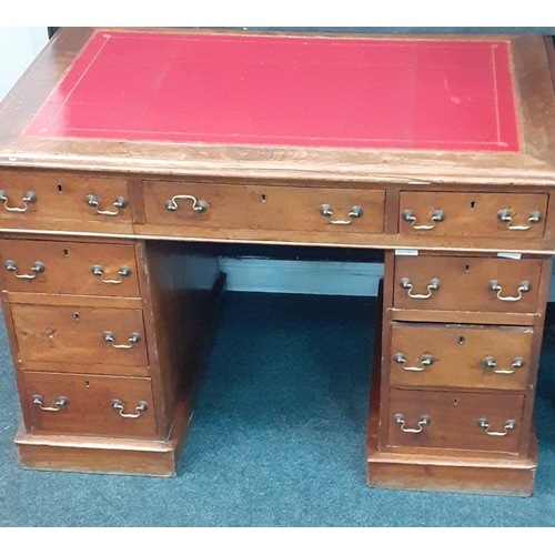 450 - FABULOUS PATINA! An EDWARDIAN nine drawer knee hole desk with red leather writing top - dimensions w... 