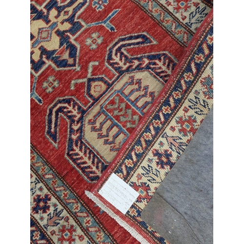 460 - A beautiful hand knotted Afghan Kazak runner carpet,  colour tones of red, turquoise, cobalt blue, b... 