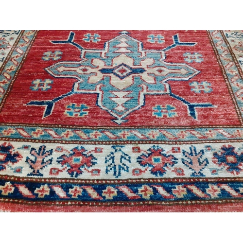 460 - A beautiful hand knotted Afghan Kazak runner carpet,  colour tones of red, turquoise, cobalt blue, b... 