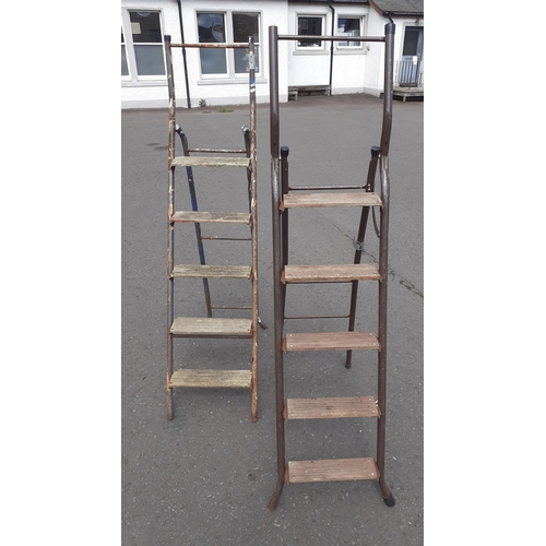 482 - Two metal tube frame folding ladders with 5 wooden steps#166